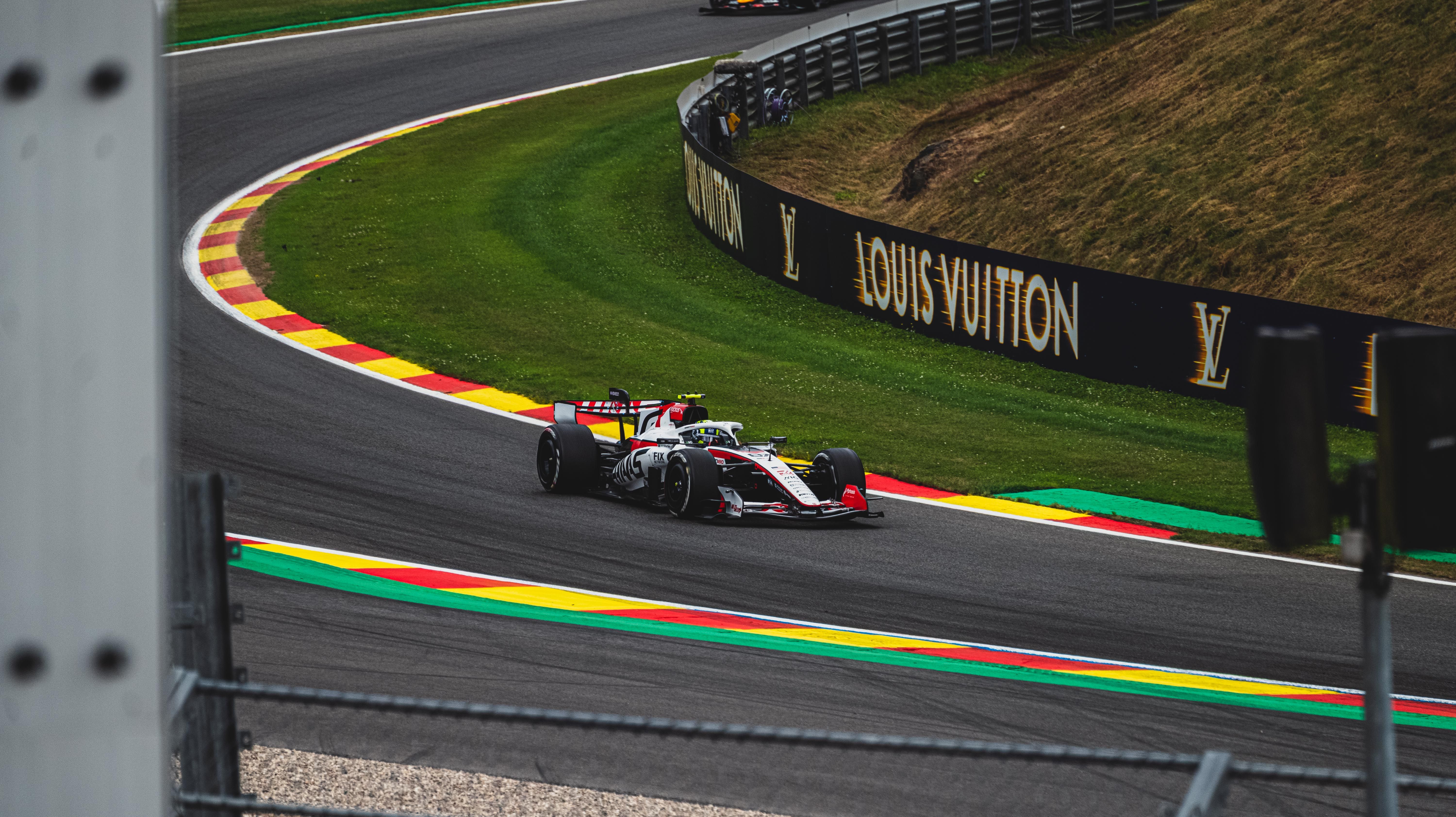 Formula 1 car racing through the famous Circuit de Spa-Francorchamps in Belgium